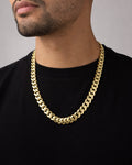 Male model wearing 14k Gold 13.3mm Miami Cuban Link Chain