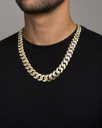 Male model wearing 14k Gold 15.1mm Cuban Link Chain