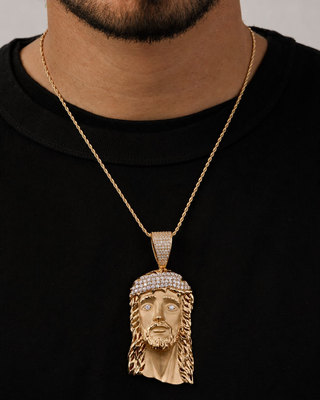 Male model wearing 14k Gold XL Jesus Head Pendants