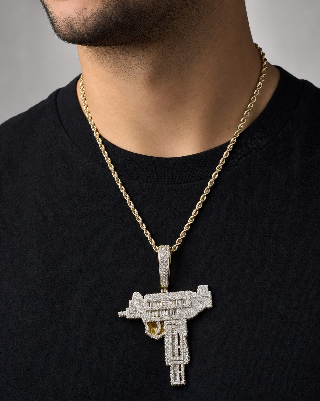Male model wearing 18k Gold and VS Diamond Jumbo Uzi Pendant