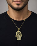 Male model wearing 10K Gold Hamsa Pendant