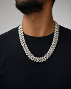 Male model wearing 14k 16.5mm Jumbo White Gold and Diamond Cuban Link Chain