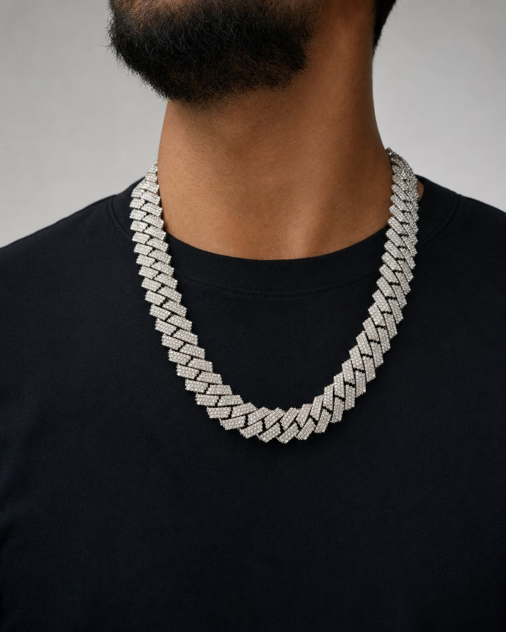 Male model wearing 14k 16.5mm Jumbo White Gold and Diamond Cuban Link Chain