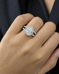 Female model wearing 14k Thick Pear Cut Lab Diamond Engagement RIng