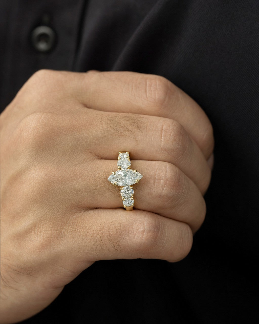 Male model wearing 14k Marquis Shaped Lab Diamond Enagement RIng