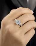 Female model wearing 14K Circle and Emerald Cut Lab Diamond Engagement Ring