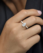 Female model wearing 14K Pear Center and Band Lab Diamond Engagement RIng