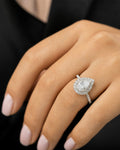 Female model wearing 14k Pear Shape Lab Diamond Engagement RIng