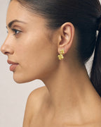 Female model wearing 18K Gold Clover earring