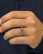 Male model wearing 10k Colorful Center Stone Flower Ring