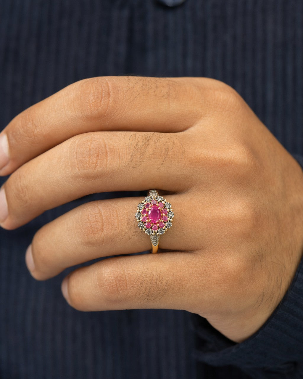 Male model wearing 10k Colorful Center Stone Flower Ring