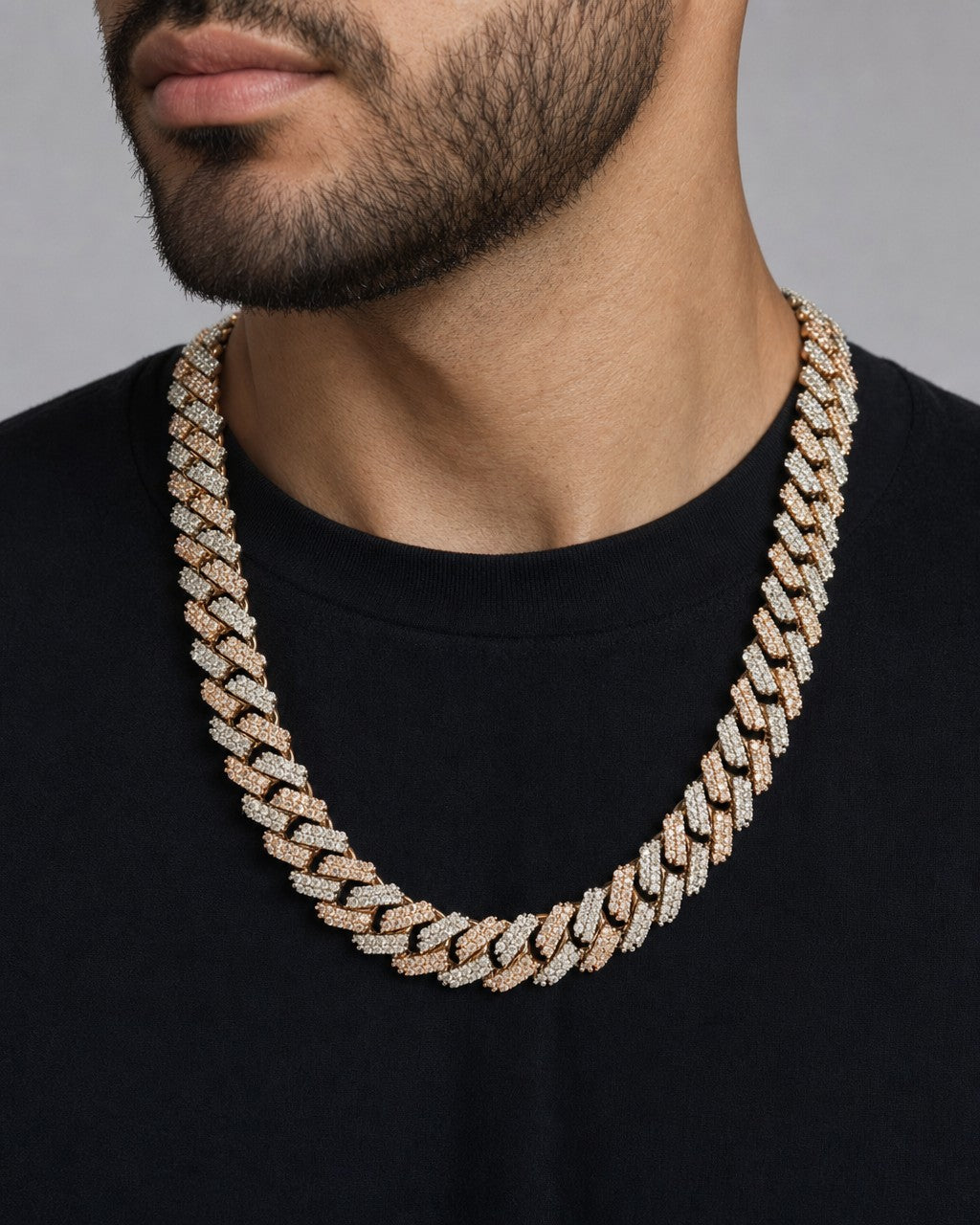 Male model wearing 10K Two-Tone Diamond Cuban link chain 16mm
