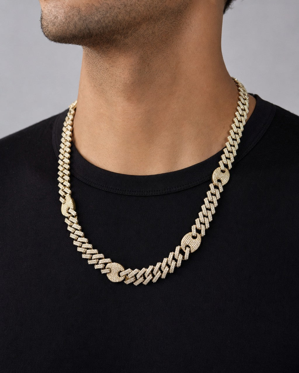 Male model wearing 10K two-tone & diamonds cuban link 10mm