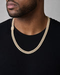 Male model wearing 14k Rose Gold Jumbo Baguette Diamond Cuban Chain 14.2mm