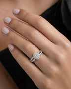 Female model wearing 14k Oval Diamond Engagement Ring