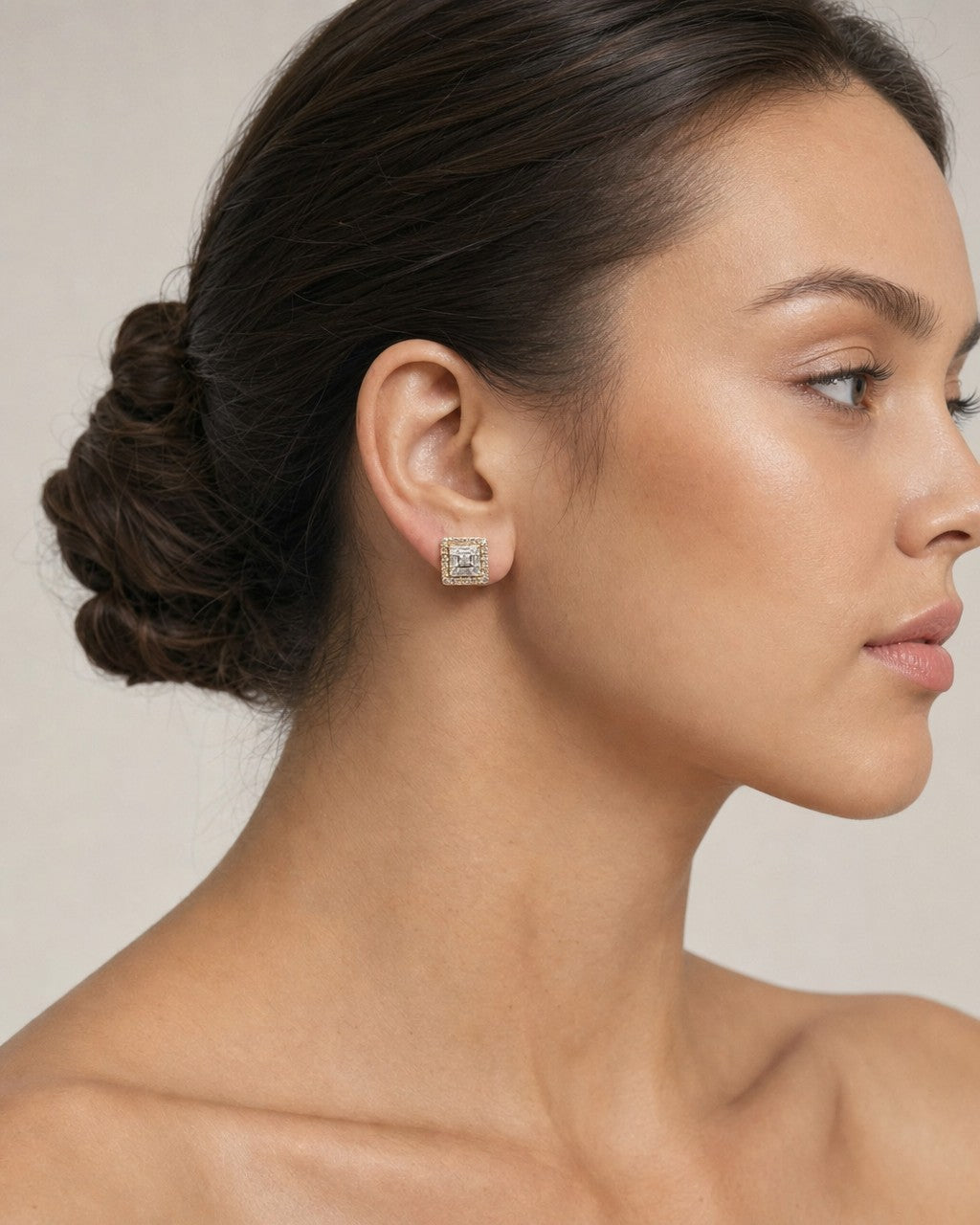 Female model wearing 10k Square Layered Baguette Diamond Earrings