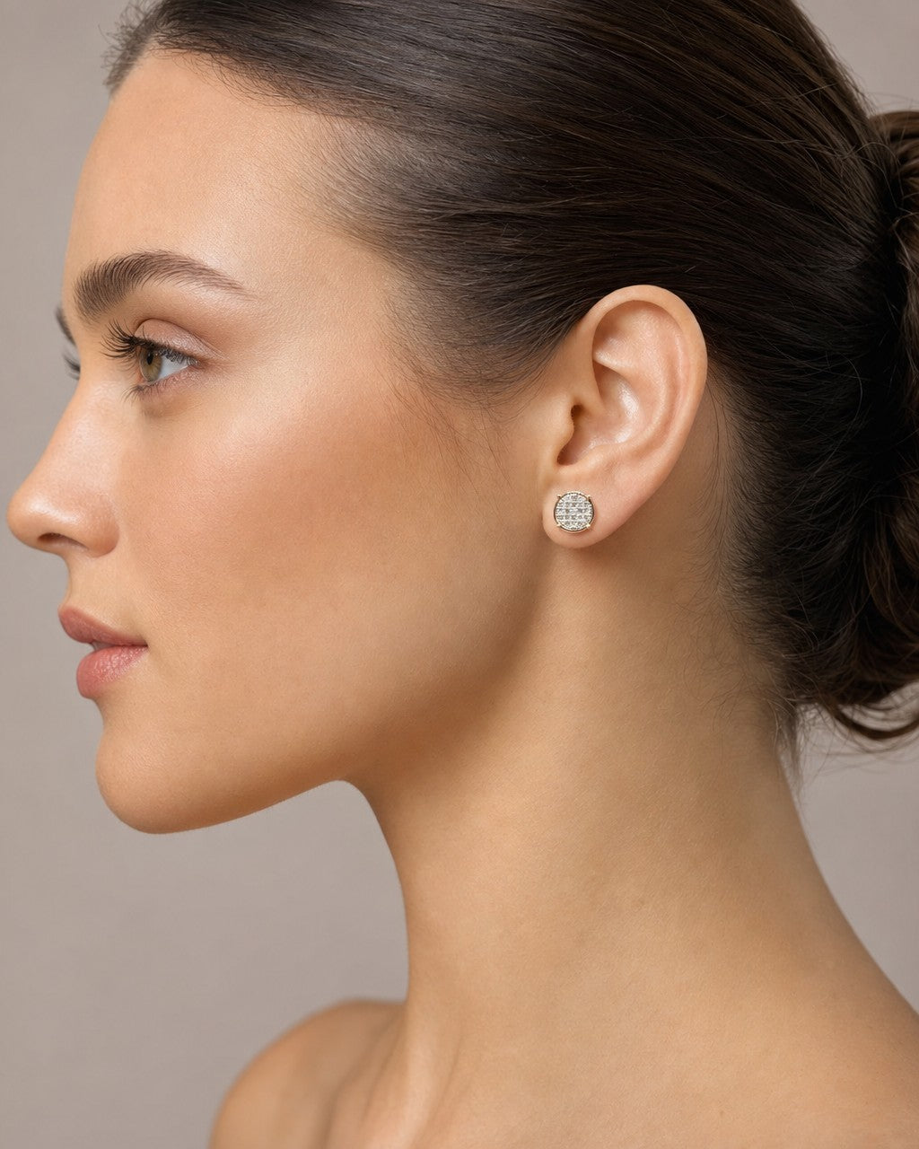 Female model wearing 10K Large Circle Cookie Earrings