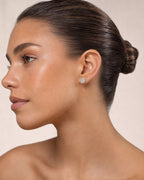 Female model wearing 10K Circle Cookie Earrings