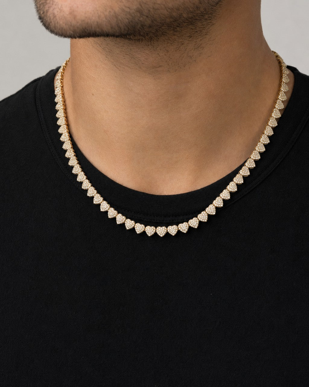 Male model wearing 14K and CZ Stones Heart Necklace