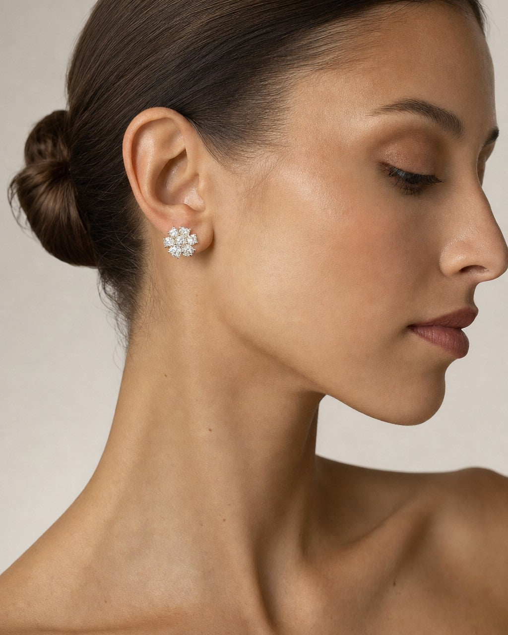Female model wearing 14K Jumbo Flowers Diamond Earrings