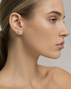 Female model wearing 14K Square Earrings .93 CT