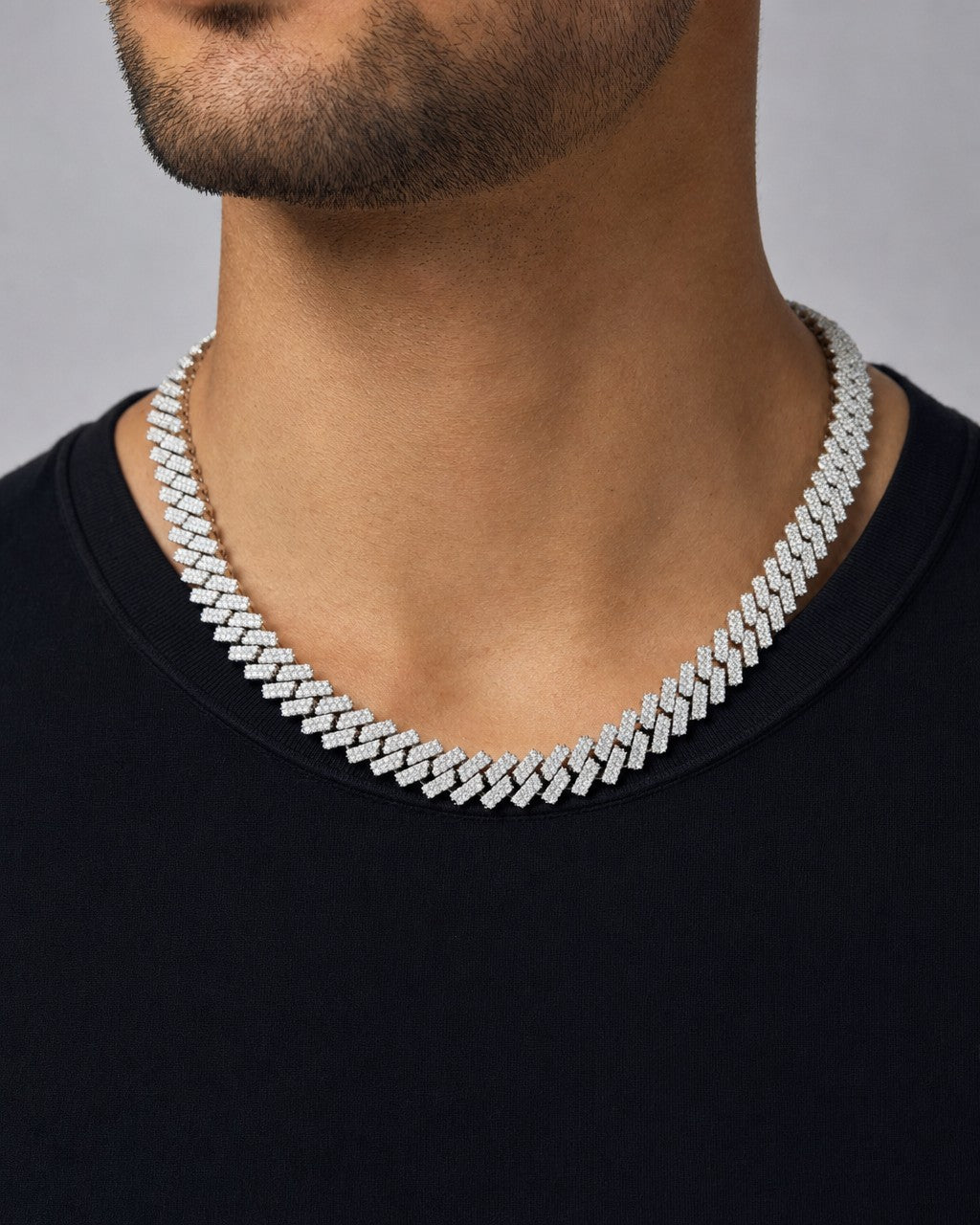Male model wearing 12.7mm Iced Out Cuban Chain 16”
