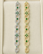 10k Gold Infinity Flower Diamond & Green Gemstone Bracelet styled photo