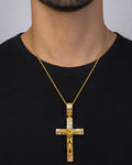 Male model wearing 14K Jesus Crucifix Cross Pendant