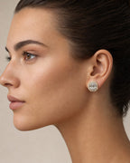 Female model wearing 10K Baguette Octagon Titan Earrings