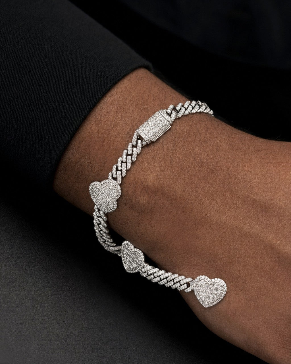 Male model wearing 10K 7 Inches Baguette Heart Cuban Bracelet