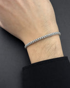 Male model wearing 14K White Gold Moon Ice Bracelet