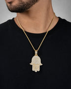Male model wearing 14k Royal Hamsa Pendant