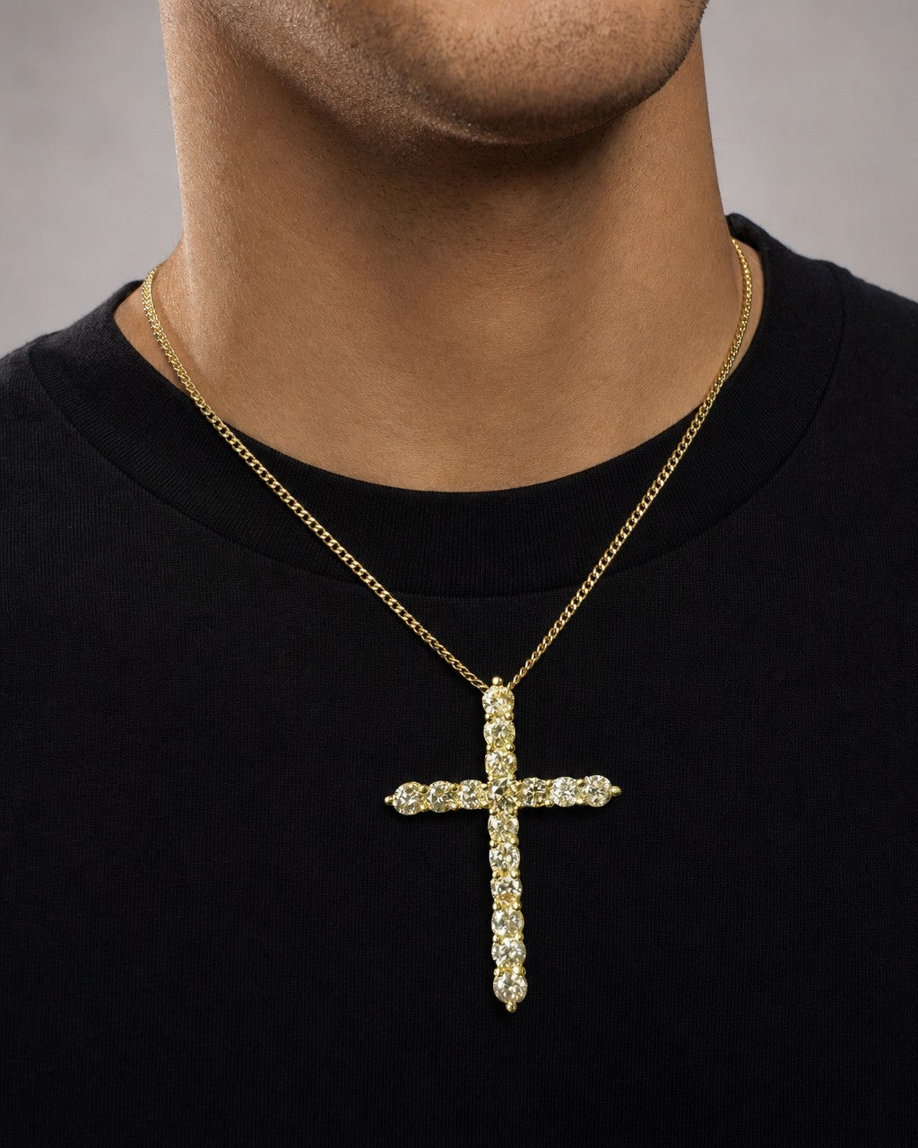 Male model wearing 10K Jubilant Diamond Cross Pendant