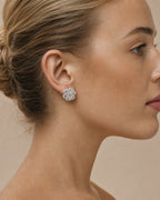 Female model wearing 14K Jumbo Flower Earrings