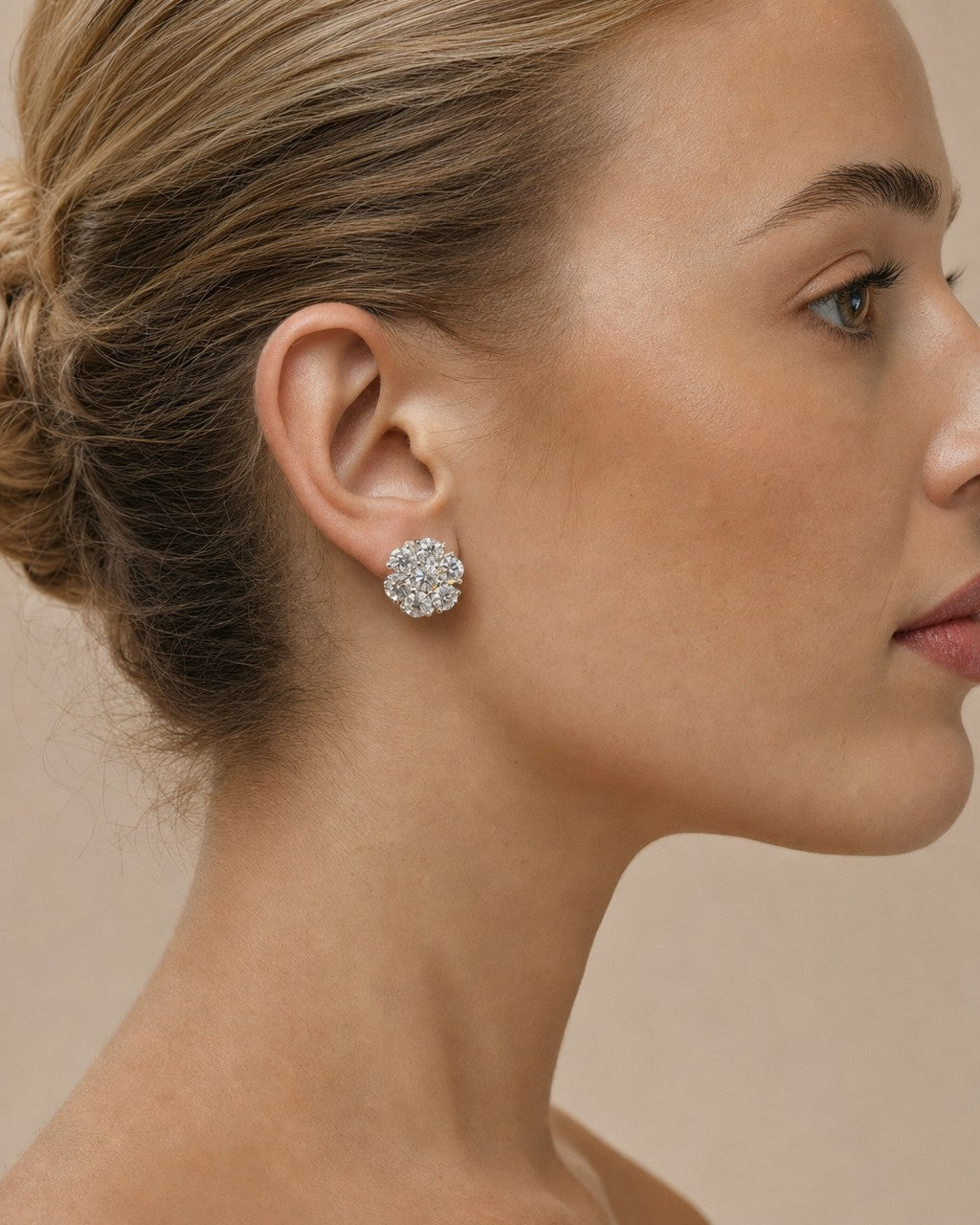 Female model wearing 14K Jumbo Flower Earrings