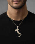 Male model wearing 14K Big Italy Boot Pendant