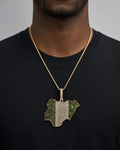 Male model wearing 14k Country of Nigeria Pendant