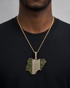 Male model wearing 14k Country of Nigeria Pendant