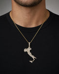 Male model wearing 14k Italy Boot Pendant