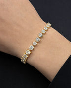Male model wearing 14K Tennis Bracelet 3 prong setting 7”
