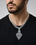 Male model wearing 14K BRIDAL BAGUETTE PEAFOWL TENNIS NECKLACE
