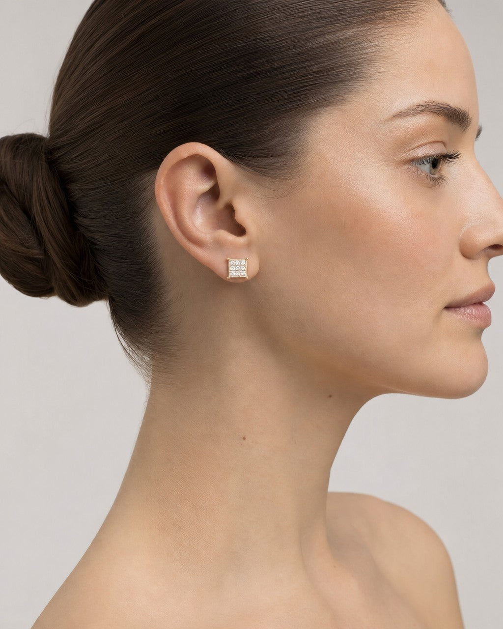 Female model wearing 10K Square Dance Floor Diamond Earrings