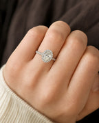 Female model wearing 14k Oval with Halo Engagement Ring