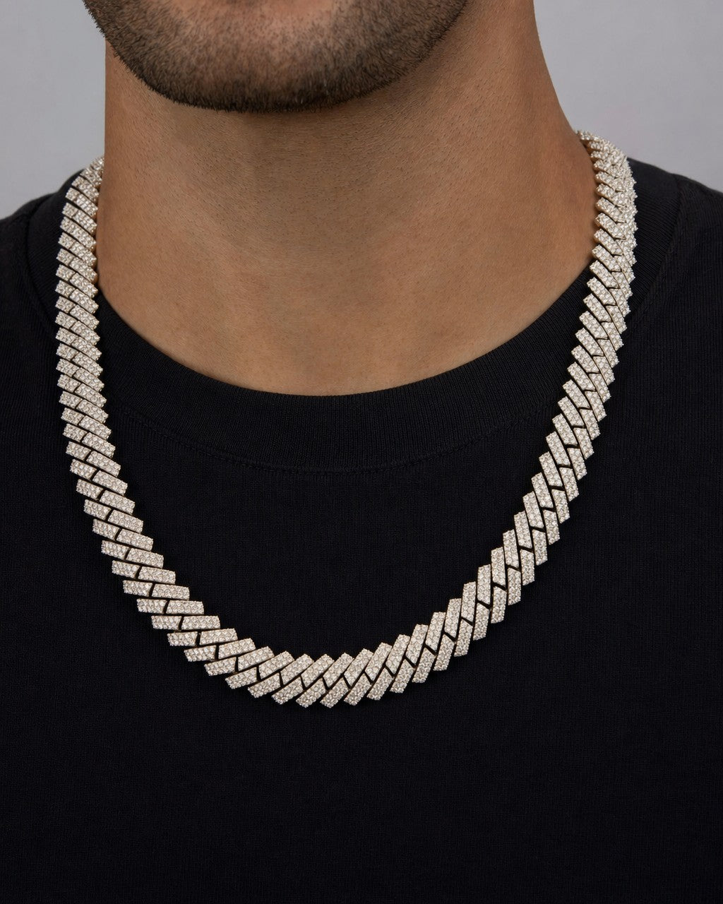 Male model wearing 14K Iced Out 14MM 22I Miami Cuban Chain