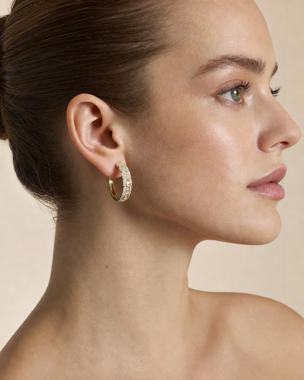 Female model wearing 14k Baguette Square Style Hoop Earrings