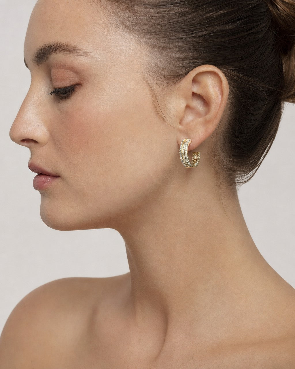 Female model wearing 14k Small Baguette Ladder In and Out Hoop Earrings