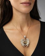 Female model wearing 10k Angel Wing Photo Pendant