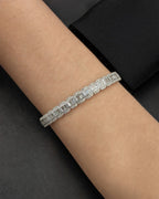 Male model wearing 14K Baguette Bangle Bracelet 6.8mm
