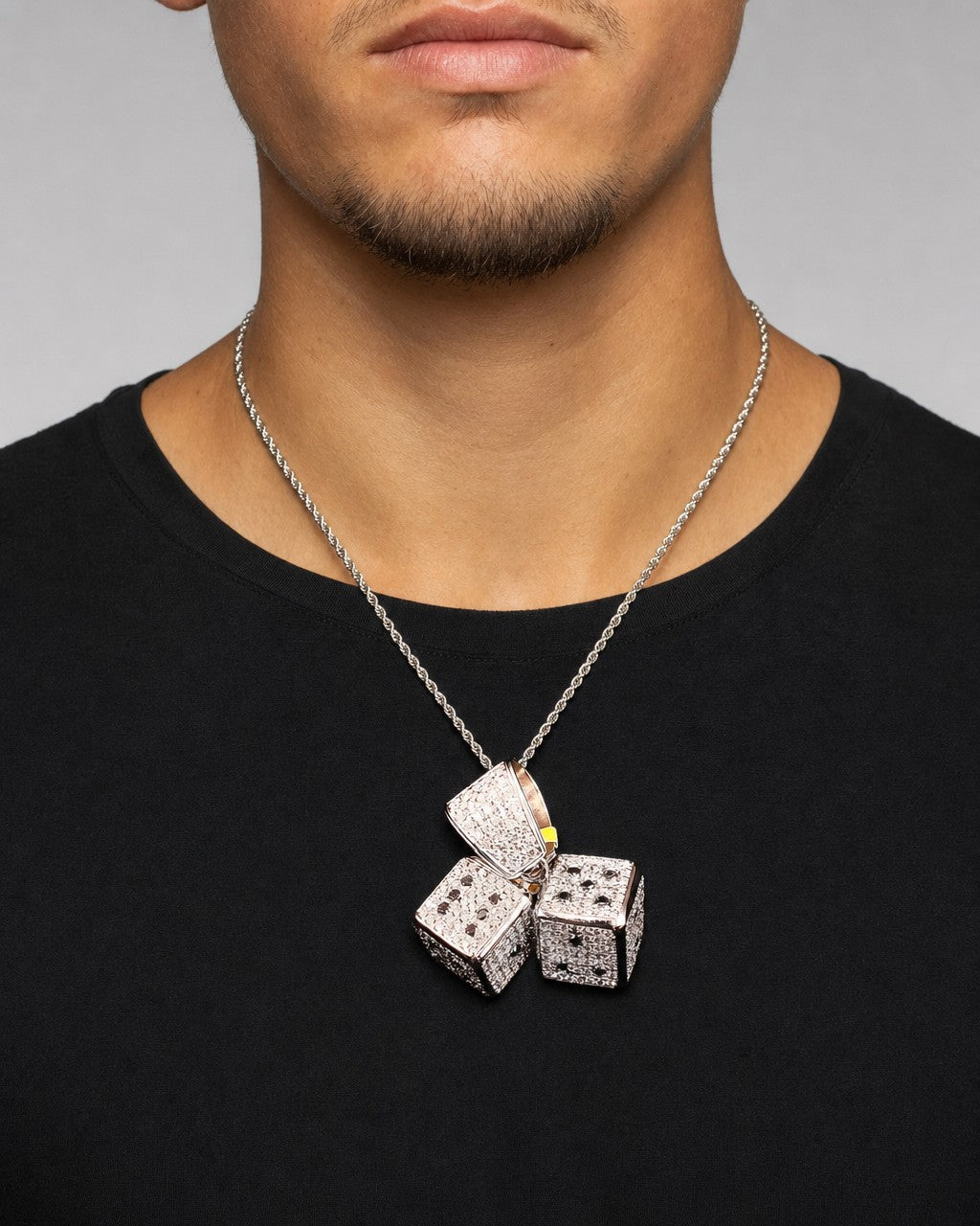 Male model wearing 14k Double Dice Pendant