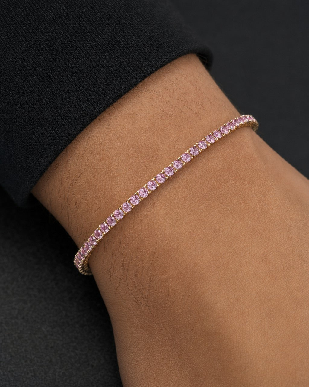 Male model wearing 14k Stunning Pink Tourmaline Tennis Bracelet